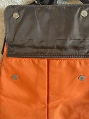 Travelon Crossbody Anti- theft Orange Purse. Multiple Pockets. Zippered. Snaps