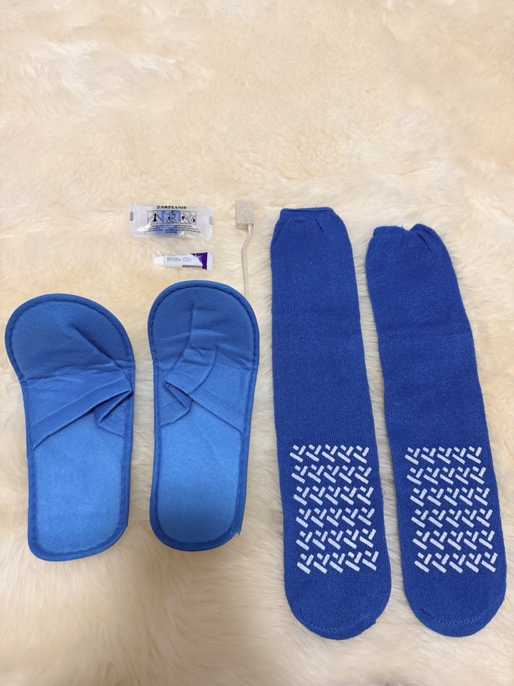 Set Of Airplane Hotel Travel Slippers, Socks, Earplugs, Toothpaste, & Toothbrush