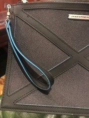 Jantaminiau Clutch Travel Kit With Strap