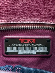 Tumi Travel burgundy leather tote / handbag expendable with double zipper READ