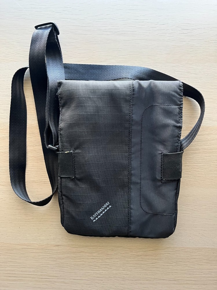 Kathmandu Black Travel Satchel 23x17x4cm – 3 Pocket/Passport Holder/Magnet Close
