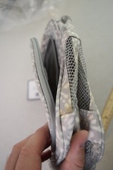 Pottery Barn gray floral toiletry bag.