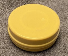 Vintage 1950&rsquo;s collapsible, folding, pocket size TRAVEL CUP. Tan plastic.